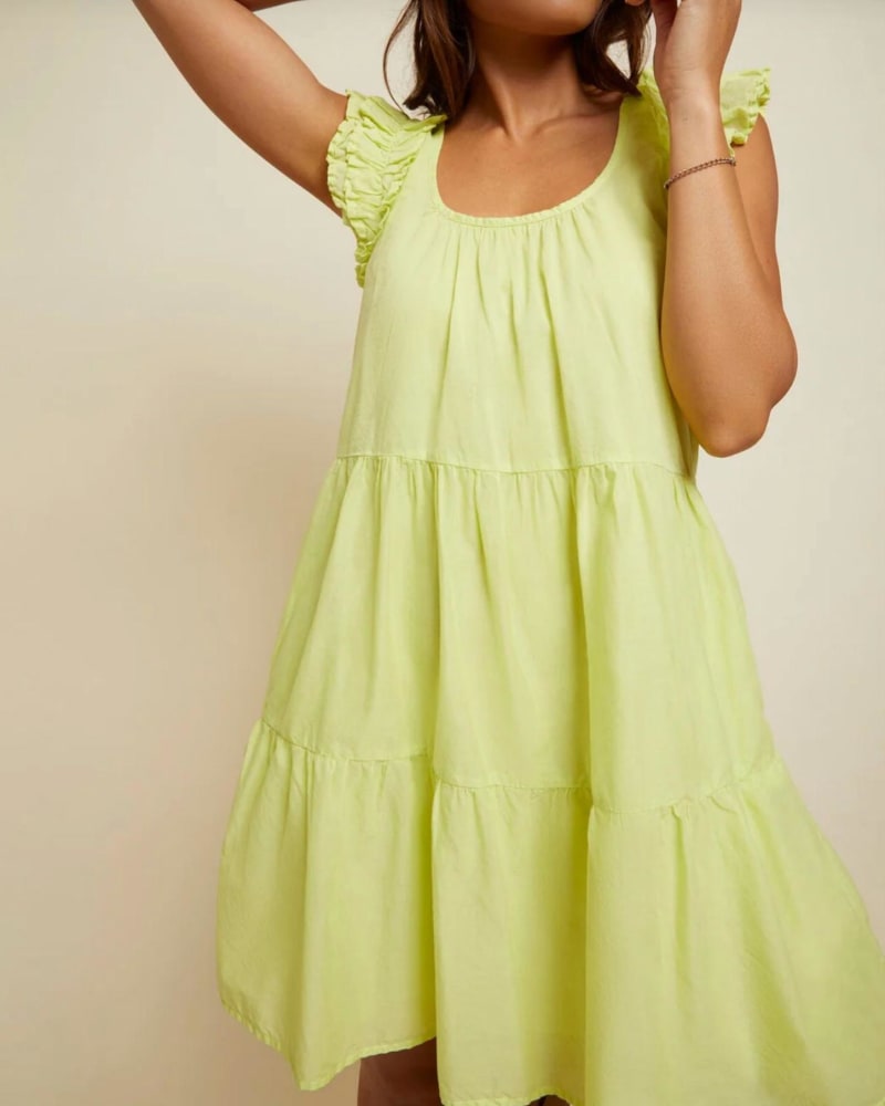 Front of a model wearing a size XXL Luella Tiered Mini Dress in Tennis Ball in Tennis Ball by Nation LTD. | dia_product_style_image_id:342730